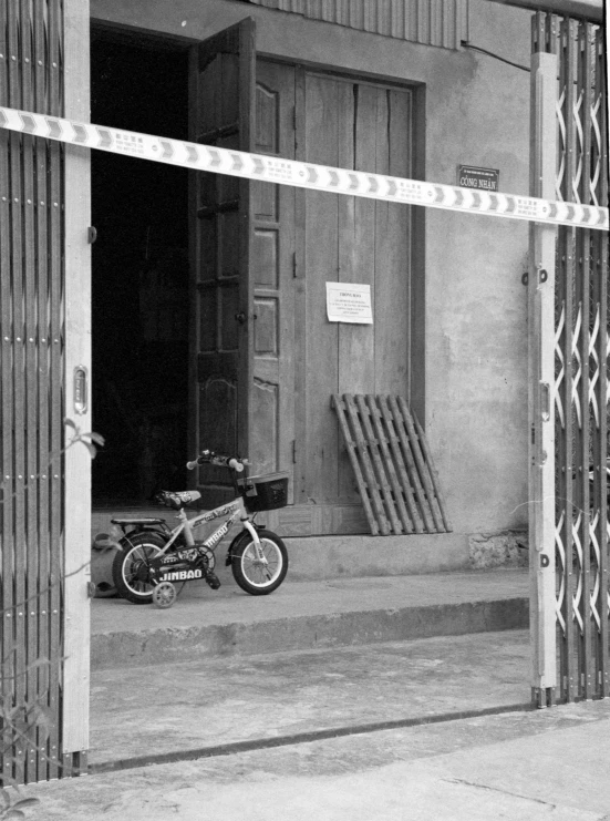 a motor bike parked outside an empty building