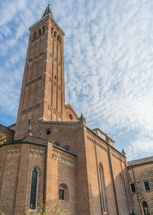 large tower in building against blue sky