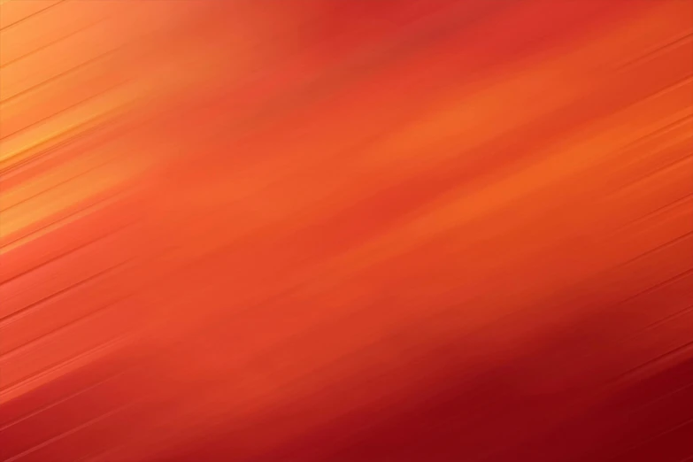 a blurry image of red and orange colors