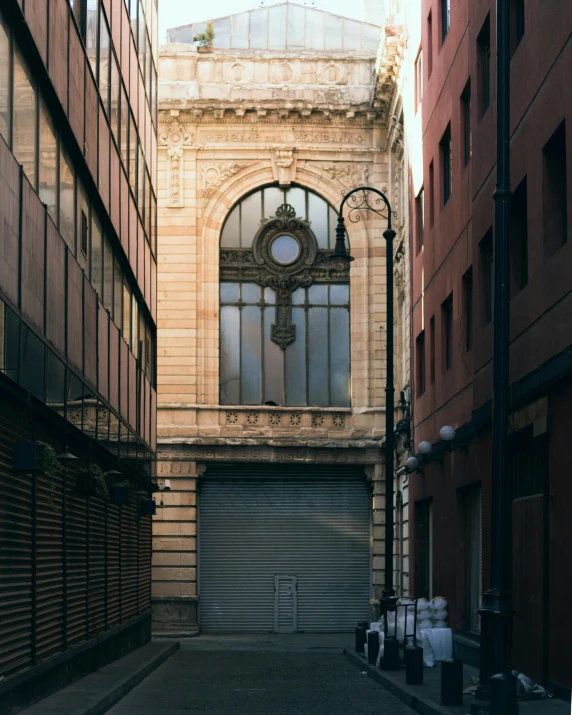 the view down an alley between two buildings