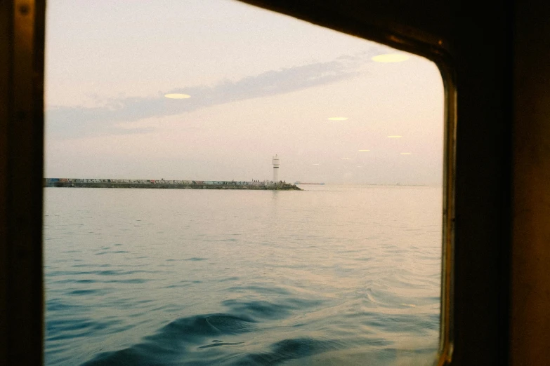 the view from inside a vehicle on the water