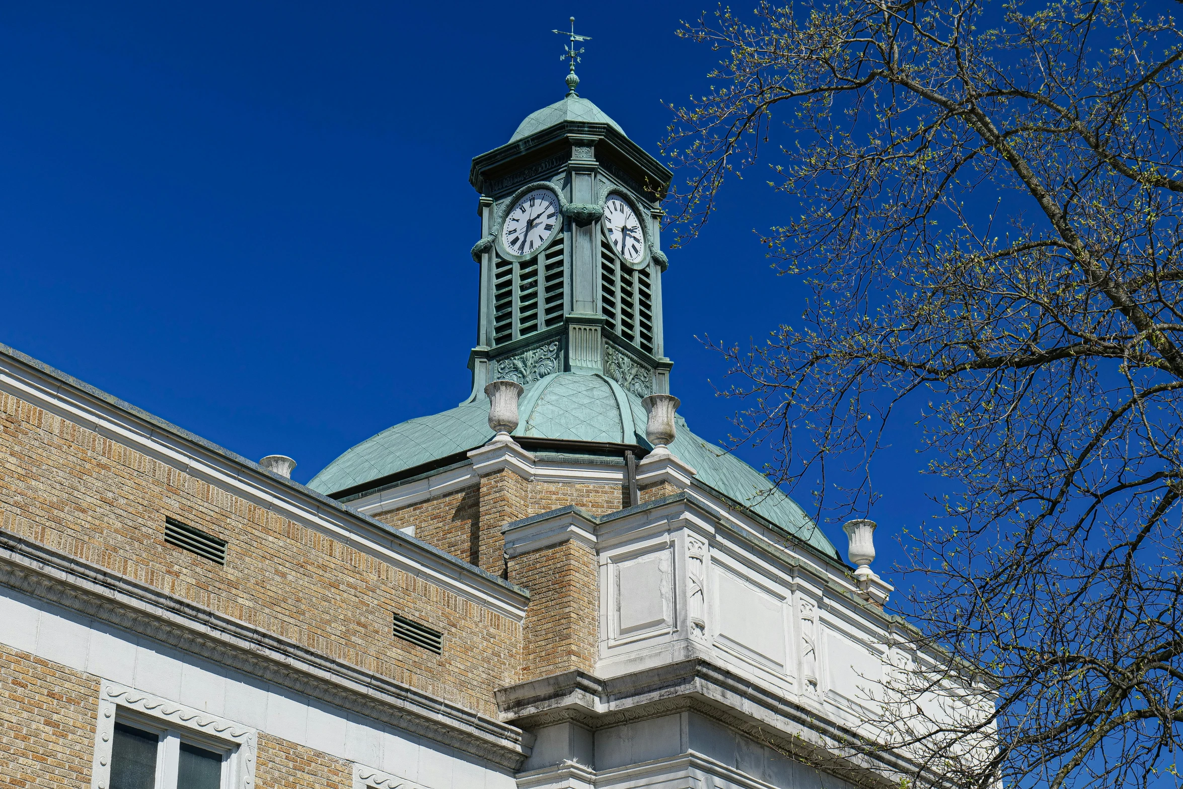 a tall building with a clock on the top