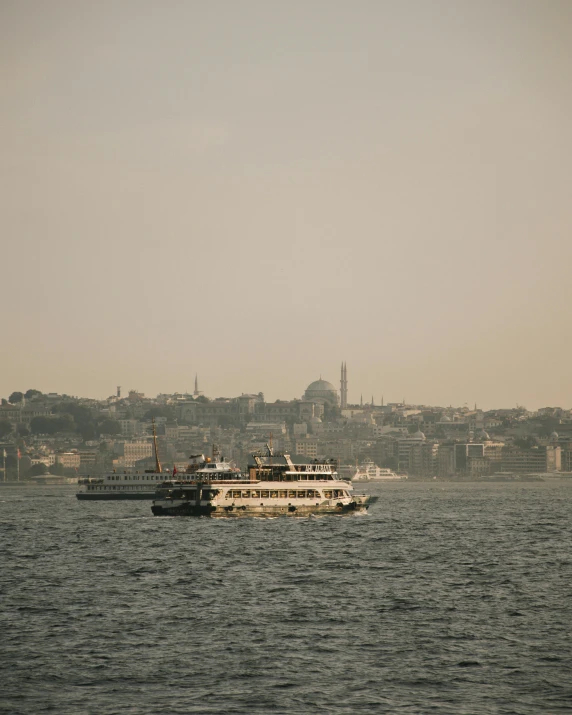 a passenger ship that is going through a body of water