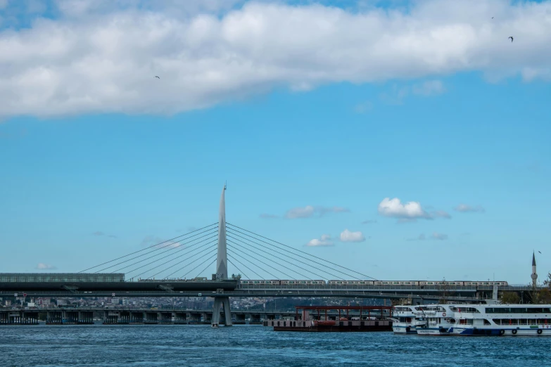 boats are anchored in the bay on a sunny day