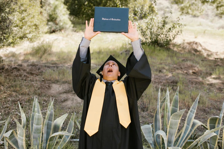 a young man is getting ready to graduate