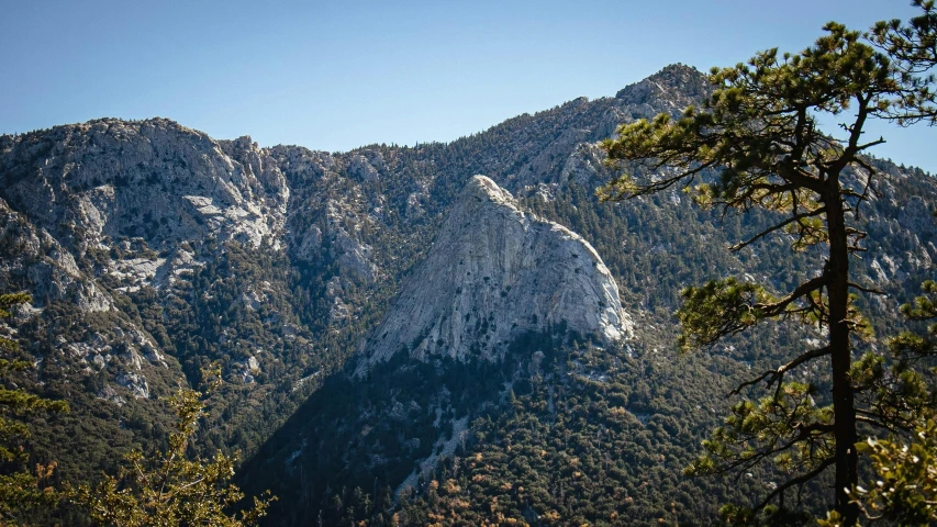 the mountains are covered with snow from below