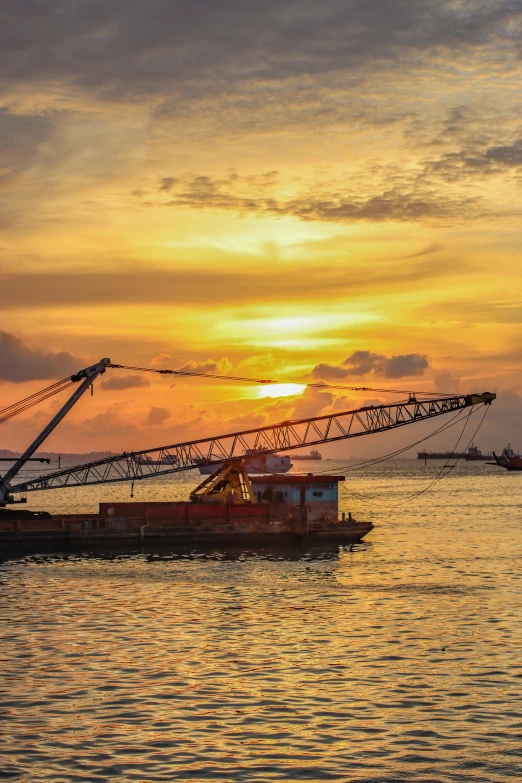 a boat sits idle at the end of the ocean