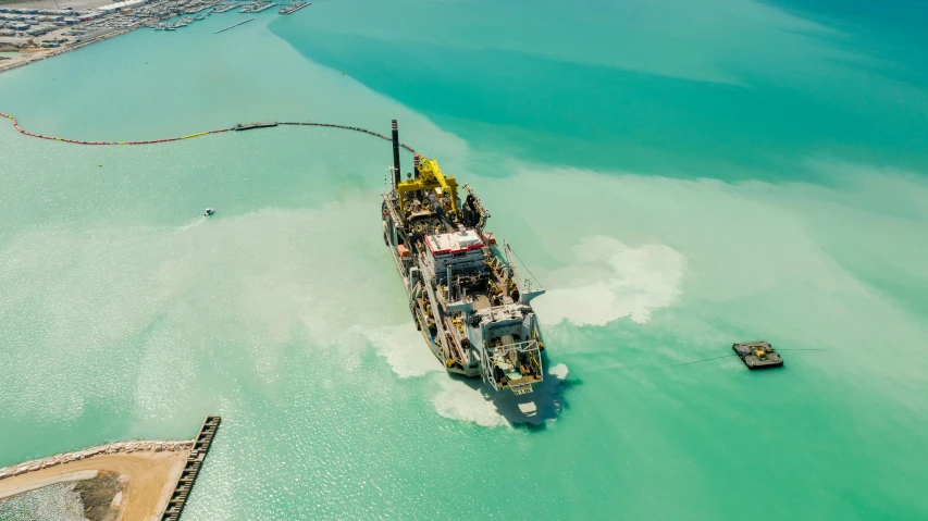 a very big ship in the water on some kind of ocean