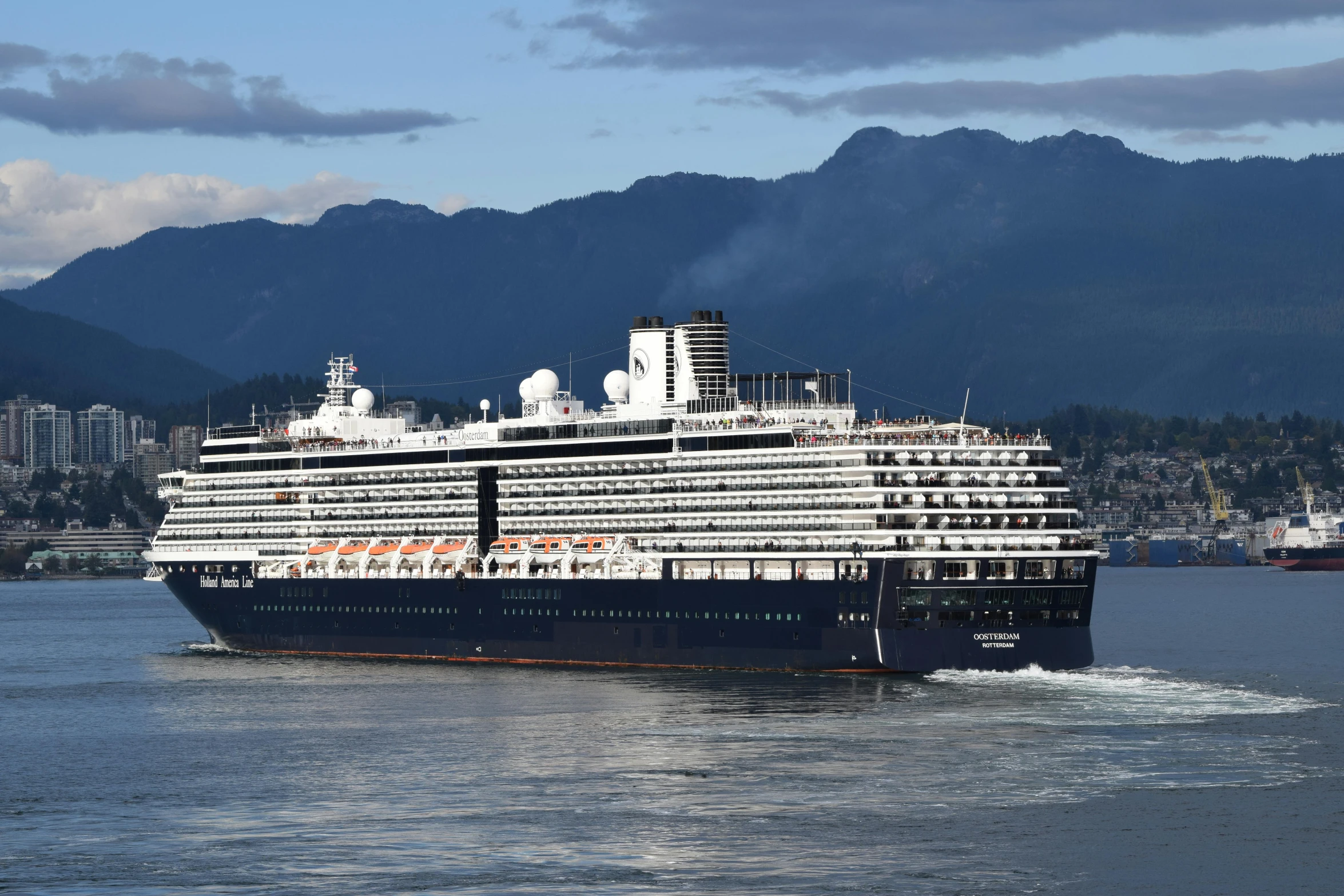 a large cruise ship is in the ocean