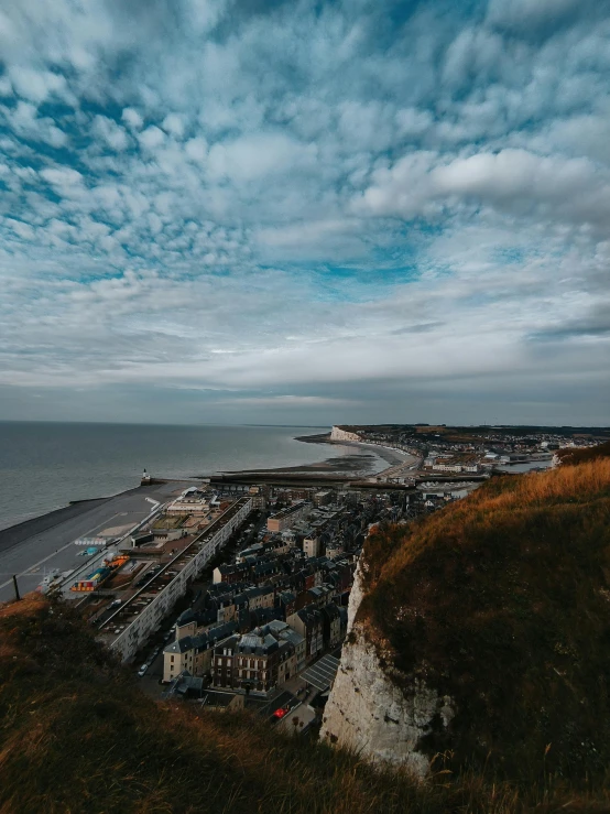 a view of a city from above on a hill