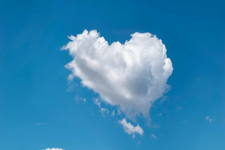 an image of the shape of a heart against a clear blue sky