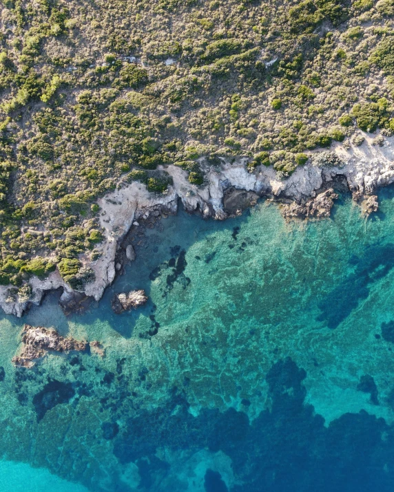 a large body of water with blue clear water