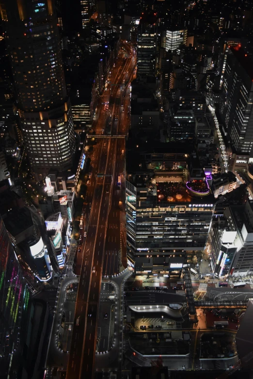 an aerial view of some very tall buildings