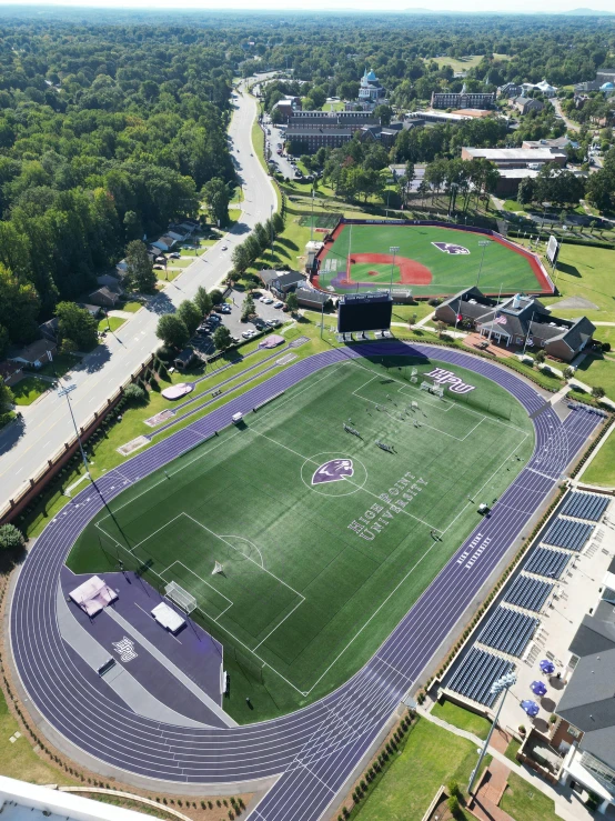 an aerial view of the soccer field at an athletic complex
