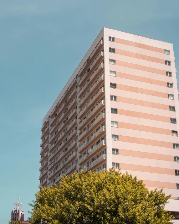 a large building with two birds on top