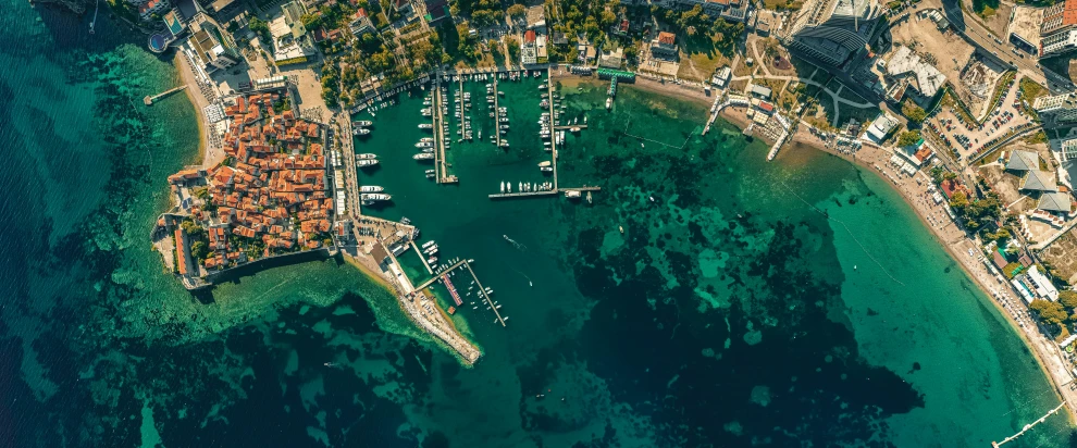 an aerial view of the marina and a town