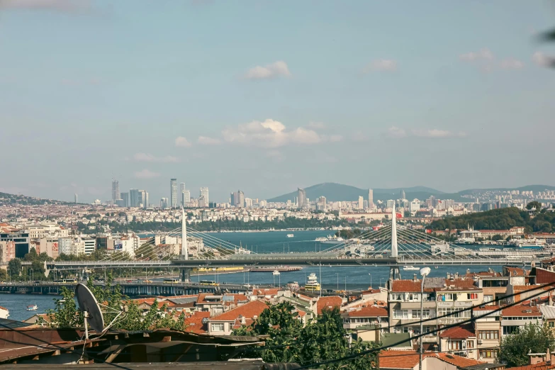 a view over the city of barcelona from atop a hill