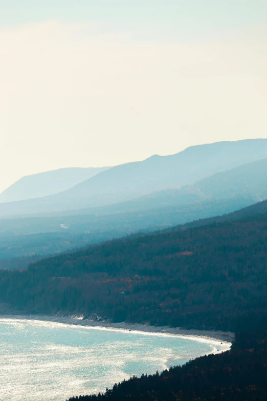 water is in the distance with mountains to the side