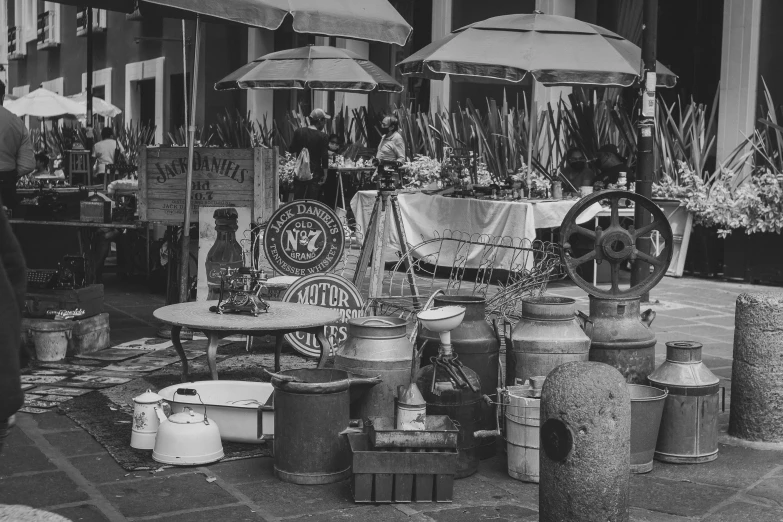 an old po of a woman looking at various items