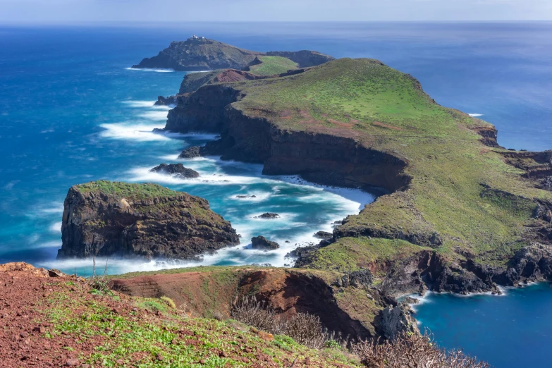 an image of an island with an ocean in the middle