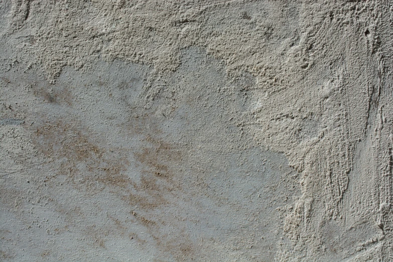 a sandy beach is covered with footprints and sand