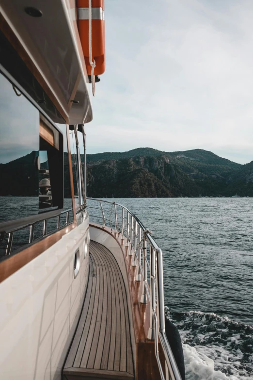 the back side of a boat on a lake or ocean