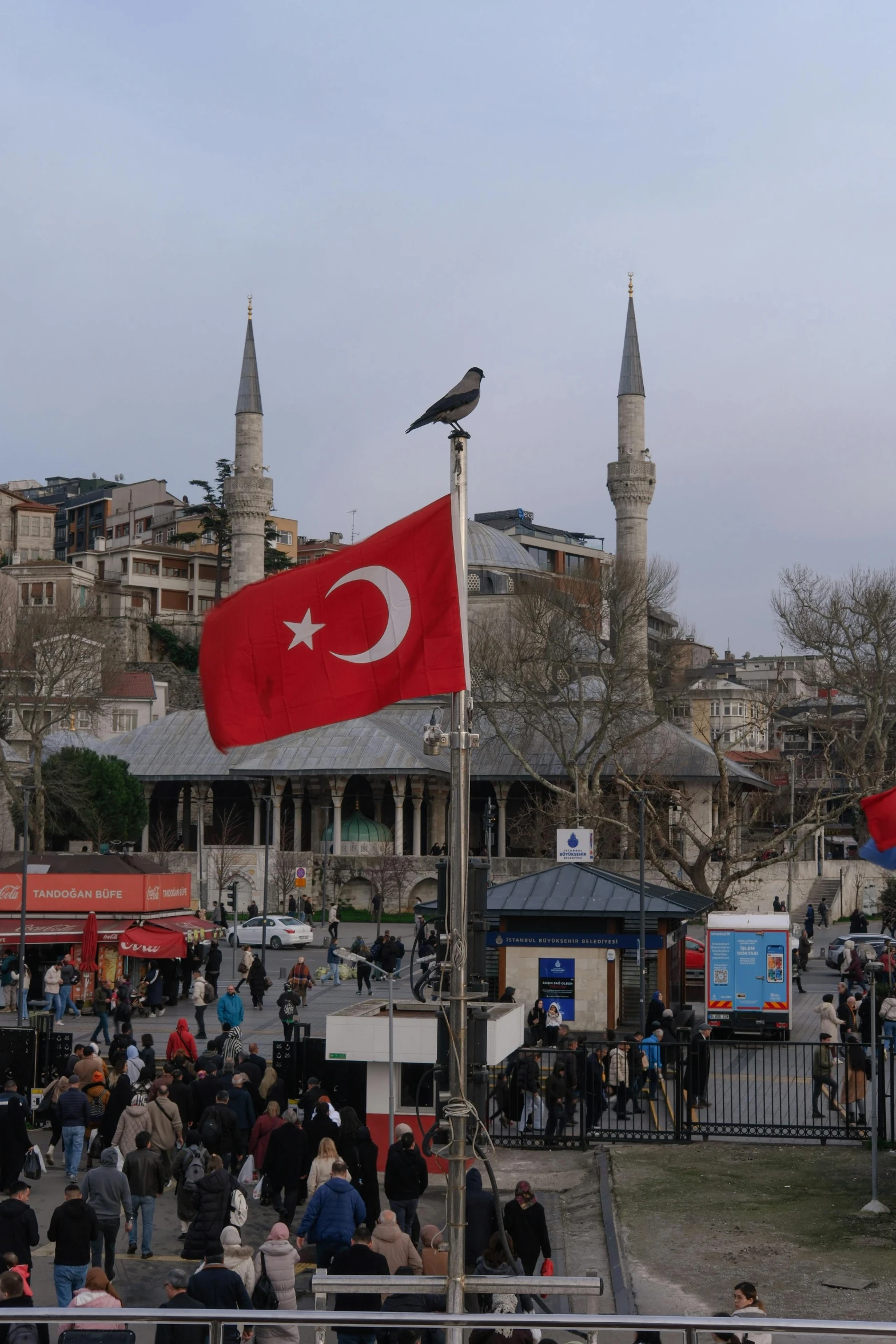 a large flag that is flying in the air