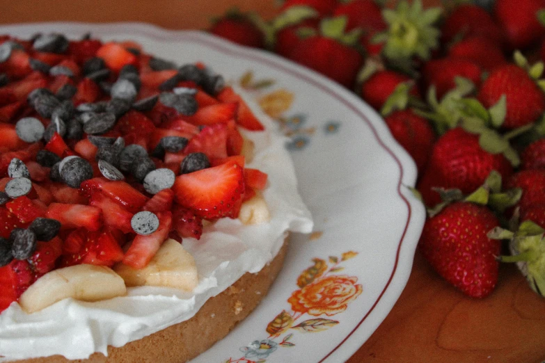 there is a fruit pie on the plate with other foods