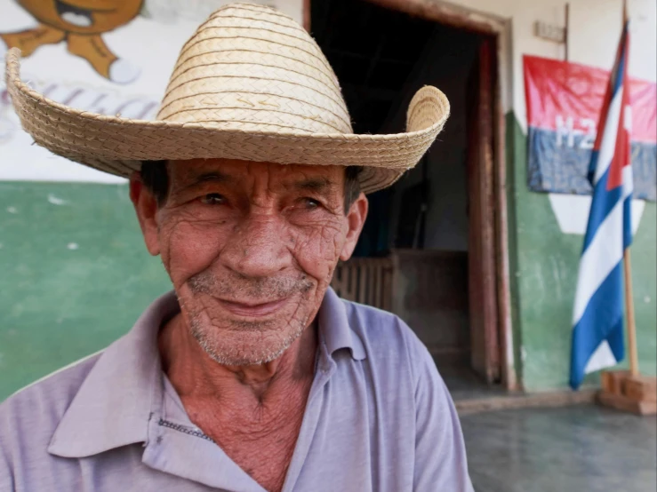 an old man in a big cowboy hat