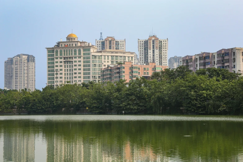 several buildings on either side of a lake