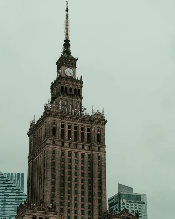 a very tall building with a clock on the top