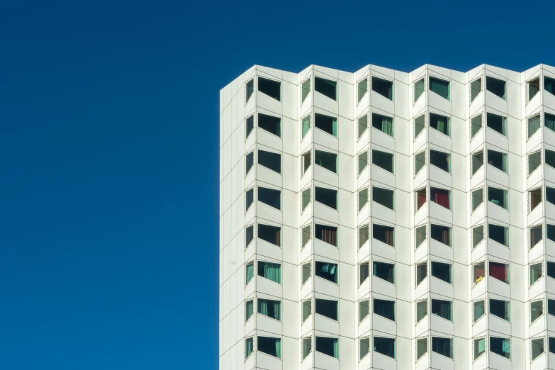 a very tall white building with many windows