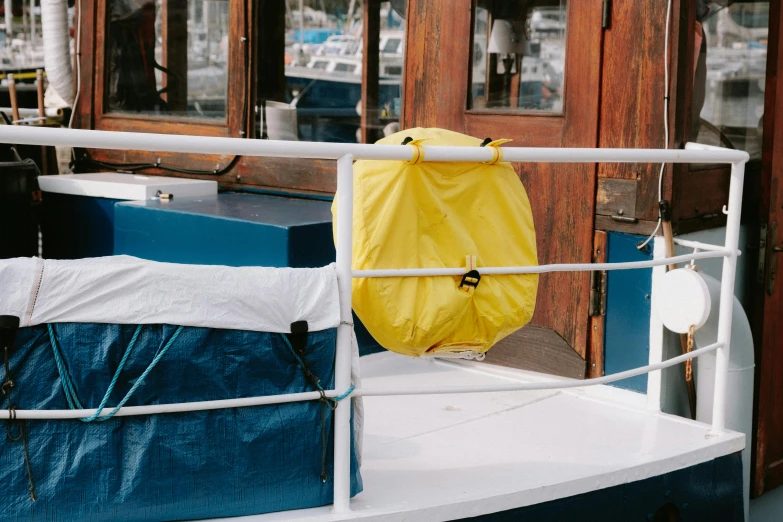 a yellow bag is on the front of a boat