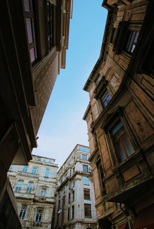 the sky is very blue and bright above the city buildings