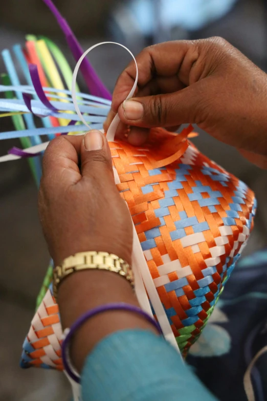 a woman doing crafts with a pair of scissors