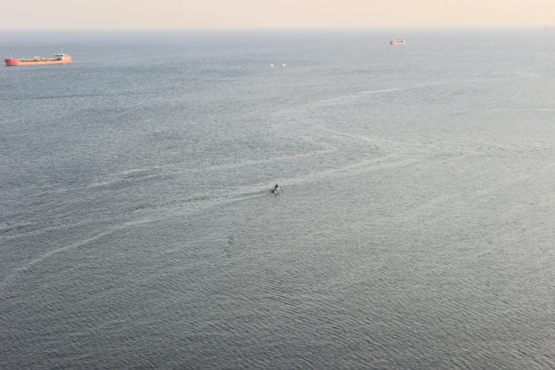 an aerial po of the ocean and the sky