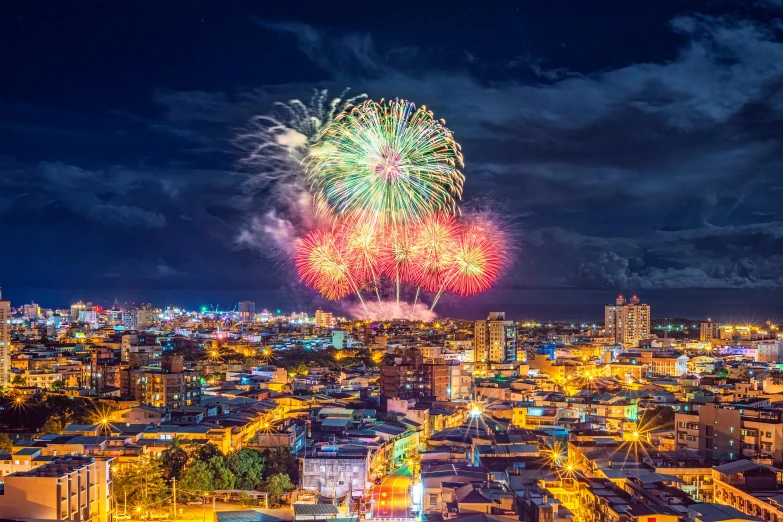 colorful fireworks light up the sky above cityscapes