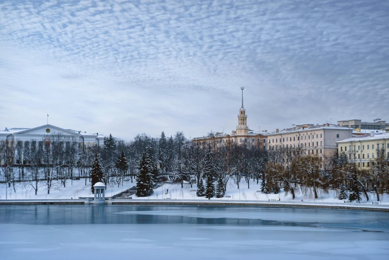 snowy day with buildings and blue skies