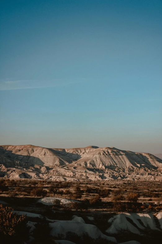 a hill with a very tall peak near by