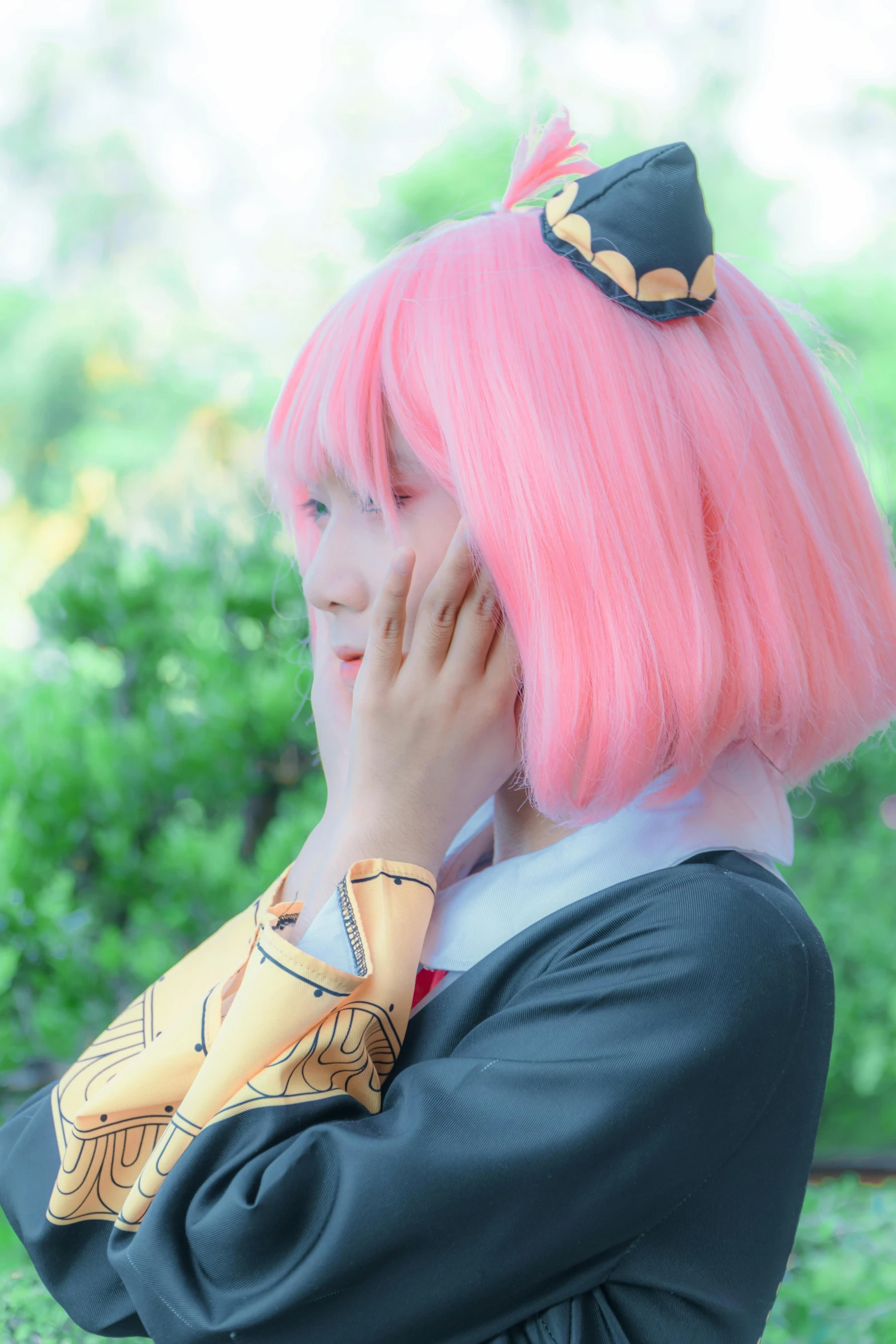 this is an image of a girl wearing pink hair and wearing an anime wig