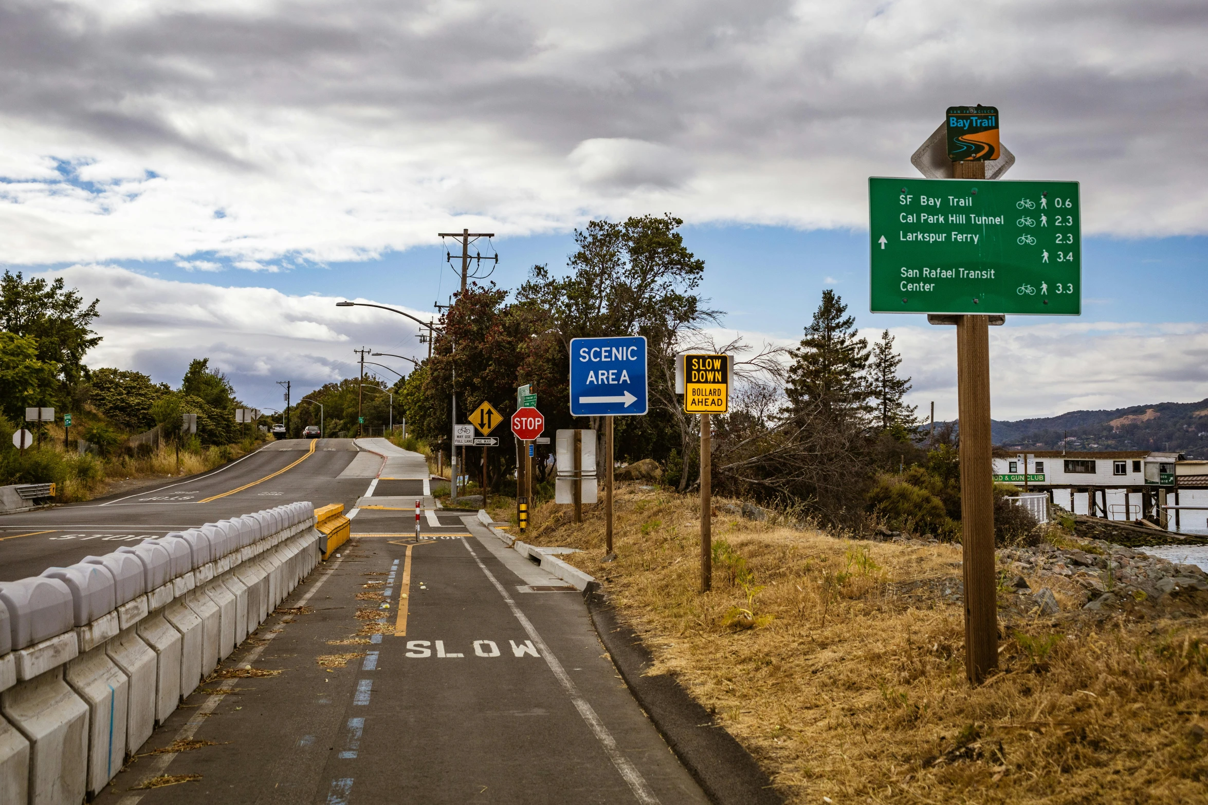 an empty road going over two bridges on it