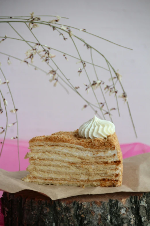 a piece of cake sits on a piece of wax paper