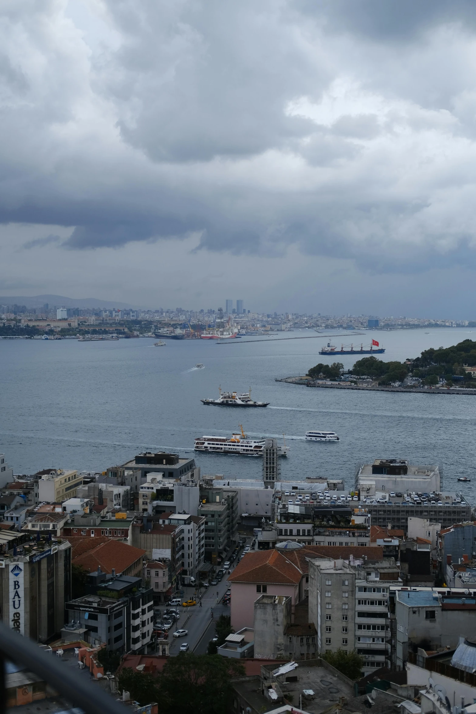 a large body of water surrounded by many buildings