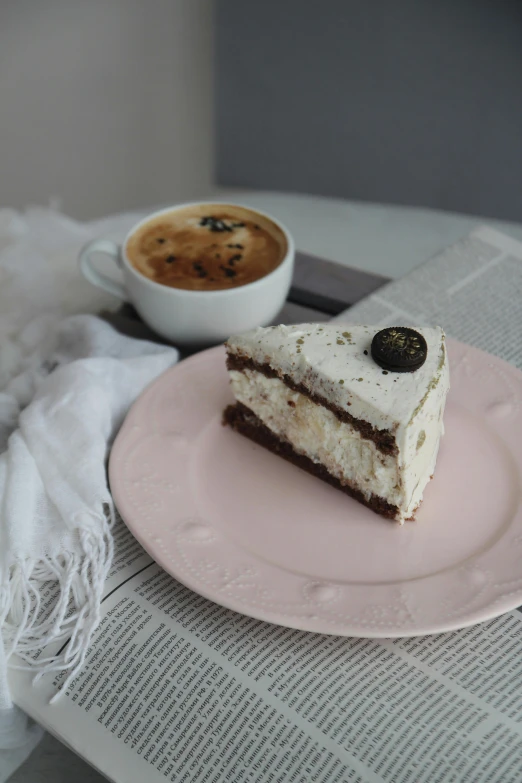 a piece of cake and coffee on a plate