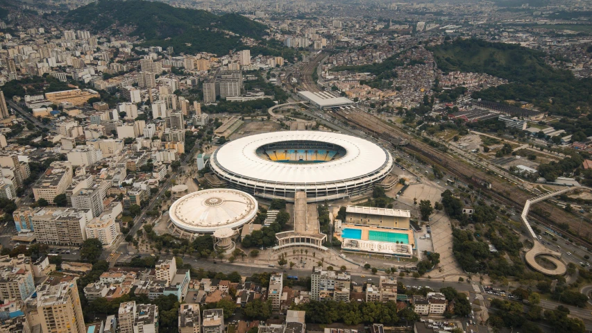 an aerial view of the stadium with its surrounding buildings