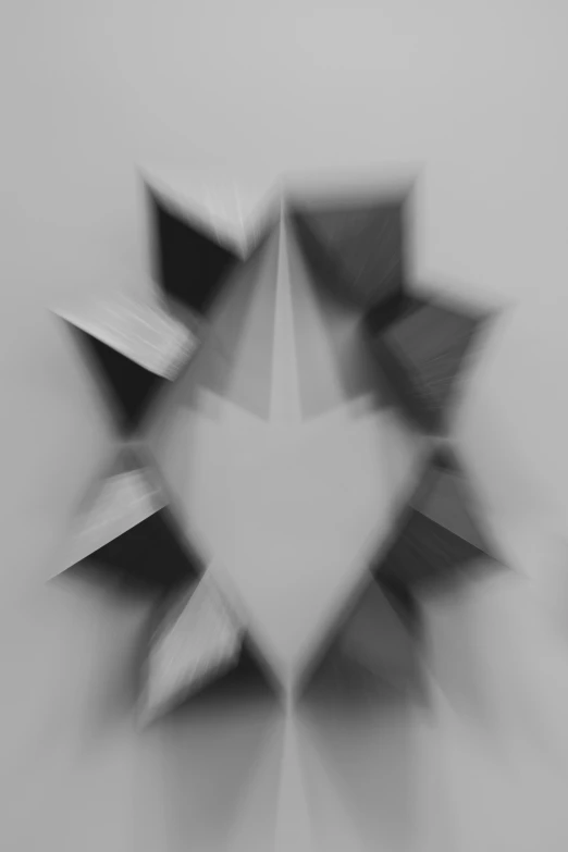 an abstract image of white and black shapes