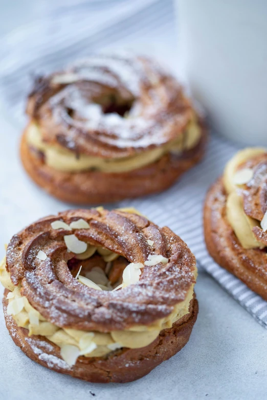 some sugar donuts that are sitting on a table