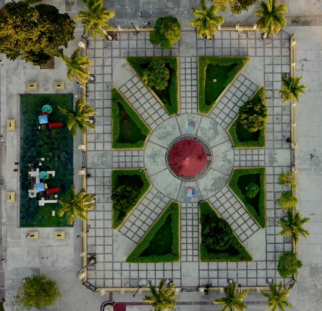 an overhead view of a park, with a park bench