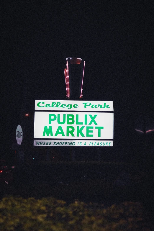 this is a sign advertising public market in the dark