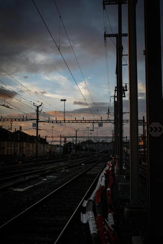 sunset along the railroad tracks as seen from a train